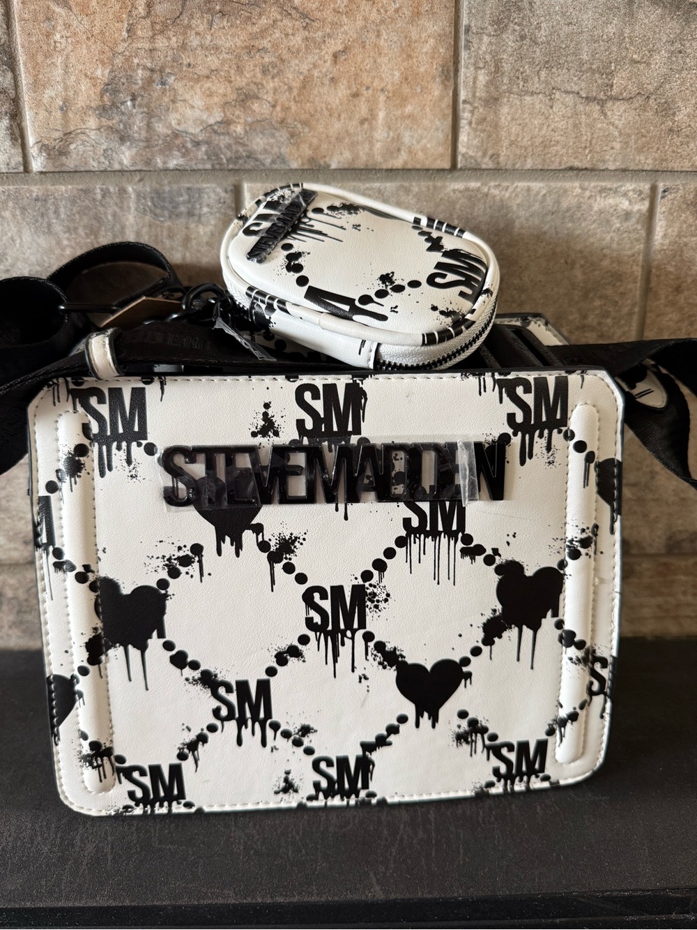 Steve Madden White and Black Drip Heart Logo Crossbody Bag